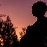 silhouette or pregnant person